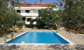 Гостиница Apartments with a swimming pool Novalja, Pag - 213  Новалья